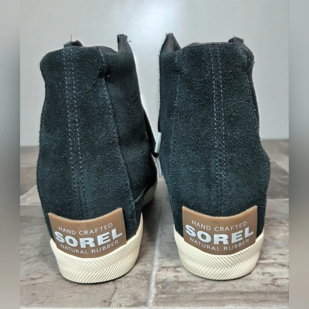 SOREL OUT 'N ABOUT SUEDE HIGH TOP WEDGE SNEAKERS.